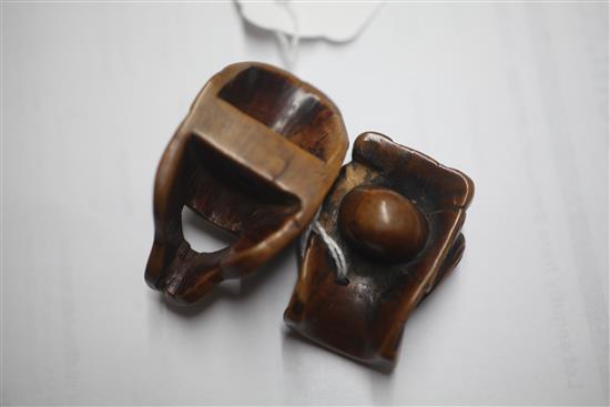 A Japanese Meiji carved wood Noh mask netsuke of Hannya and another similar